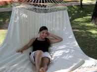 Comfortable natural white hammock with wooden bar for one or two people. 86405
